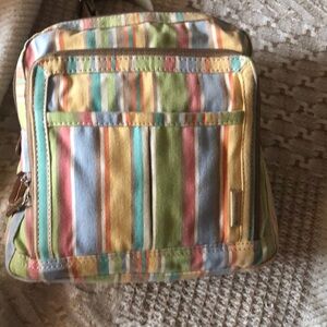 Cute, colorful, canvas Crossbody has thick adjustable strap, multi-colored